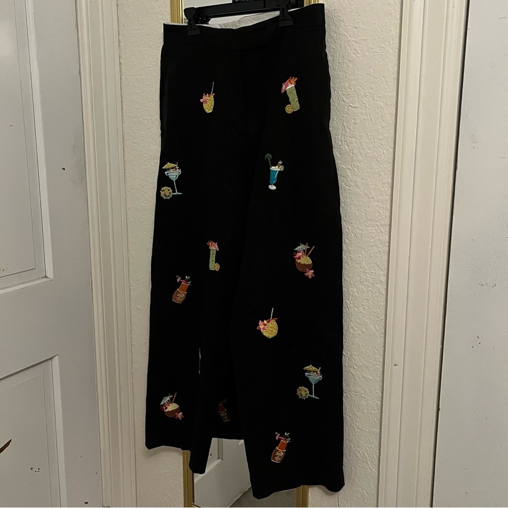 Black pants with knitted cocktails